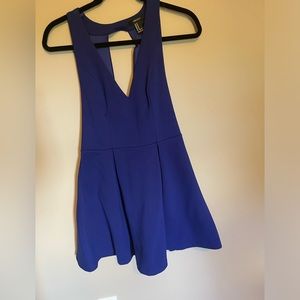 Fully lined V neck dress. With open back.